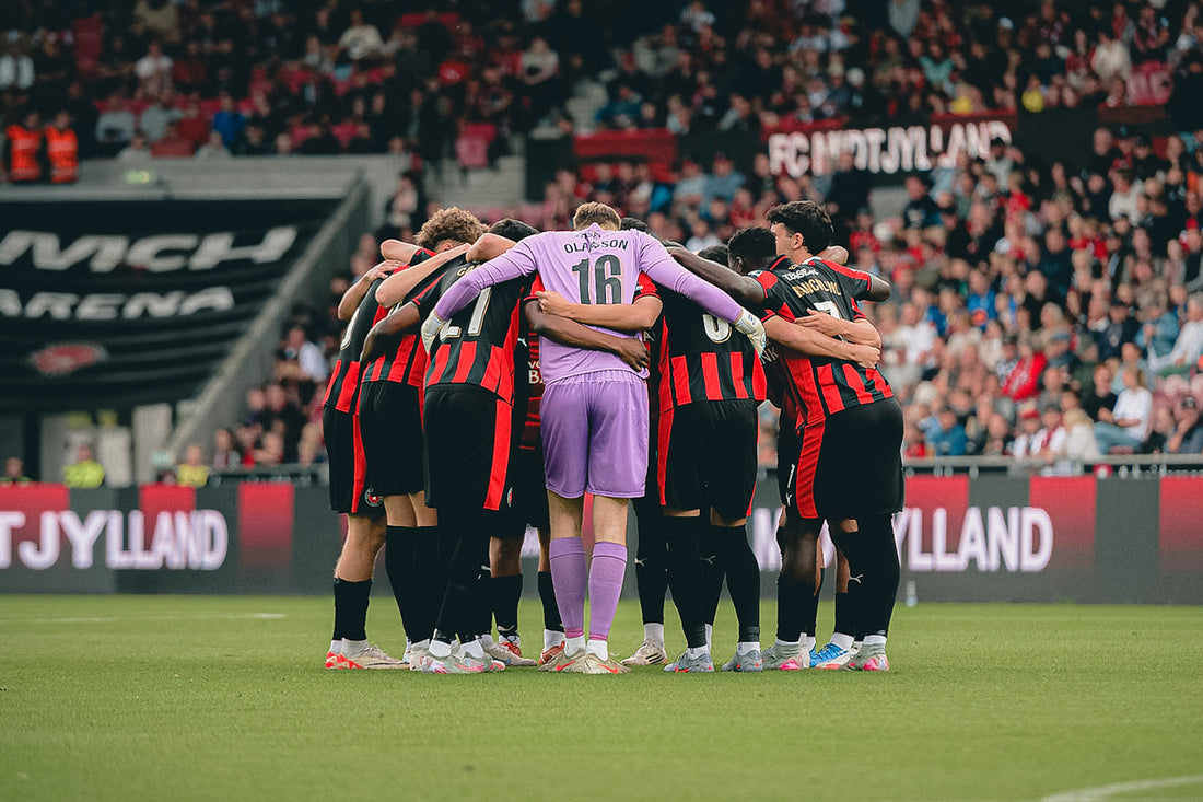 FC Midtjylland players huddle before a home match at MCH Arena