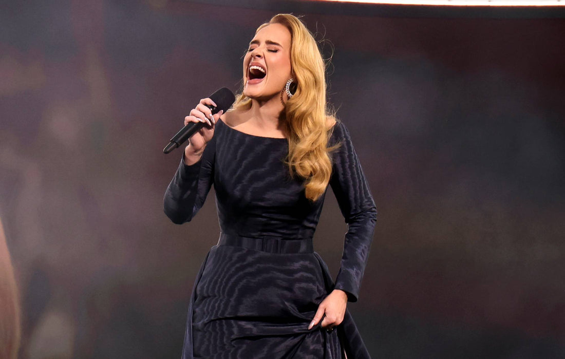 Adele performing onstage during her Munich residency in August 2024