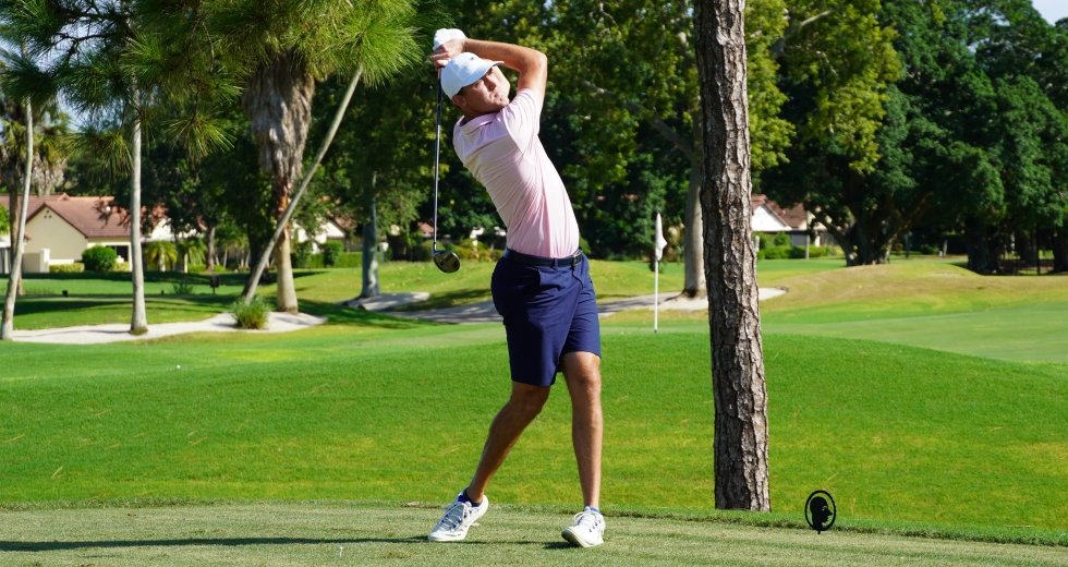 Austin Lemieux follows through on a golf shot during his 2026 amateur breakthrough.