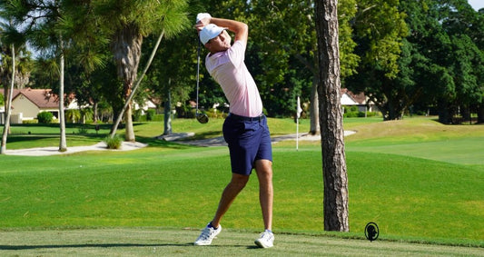 Austin Lemieux follows through on a golf shot during his 2026 amateur breakthrough.
