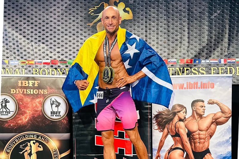 Adnan Alagić posing with medals and the Bosnia and Herzegovina flag after the 2026 IBFF World Championship