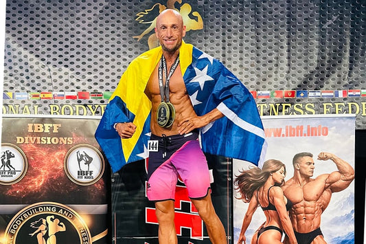 Adnan Alagić posing with medals and the Bosnia and Herzegovina flag after the 2026 IBFF World Championship
