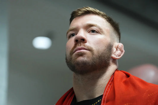 Dricus du Plessis in a 2026 UFC portrait wearing a red outer layer.