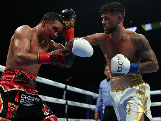 Joe Cordina exchanges punches with Gabriel Flores Jr in December 2025