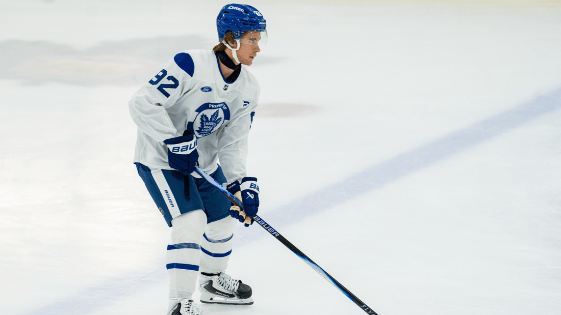 Gavin McKenna skating in a white Toronto Maple Leafs practice jersey in September 2026