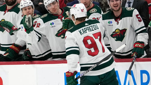 Kirill Kaprizov celebrates with Minnesota Wild teammates