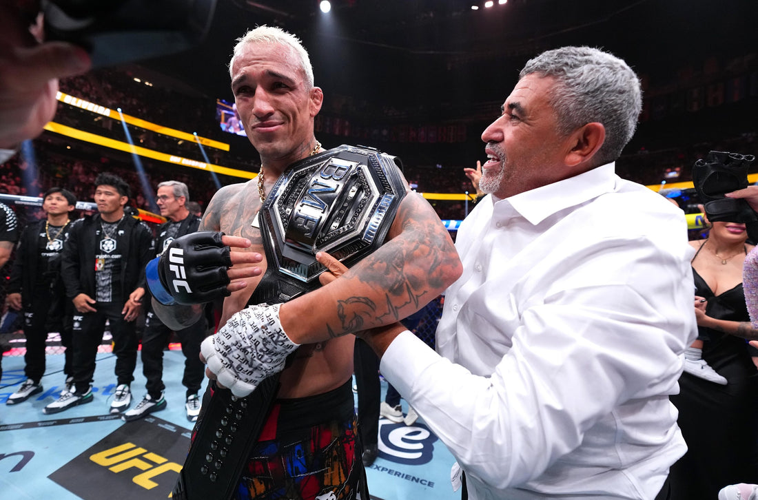 Charles Oliveira wearing the BMF championship belt after UFC 326