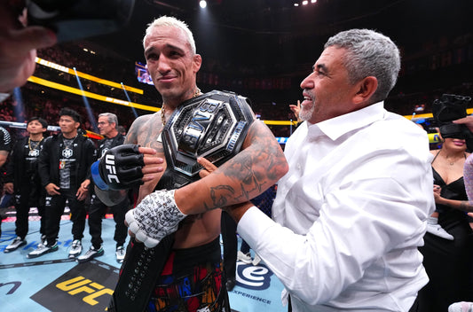 Charles Oliveira wearing the BMF championship belt after UFC 326