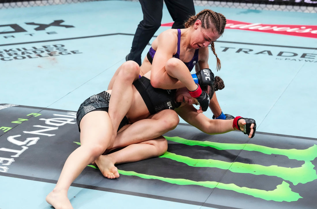 Jasmine Jasudavicius grapples with Erin Blanchfield at UFC Edmonton on October 17, 2026