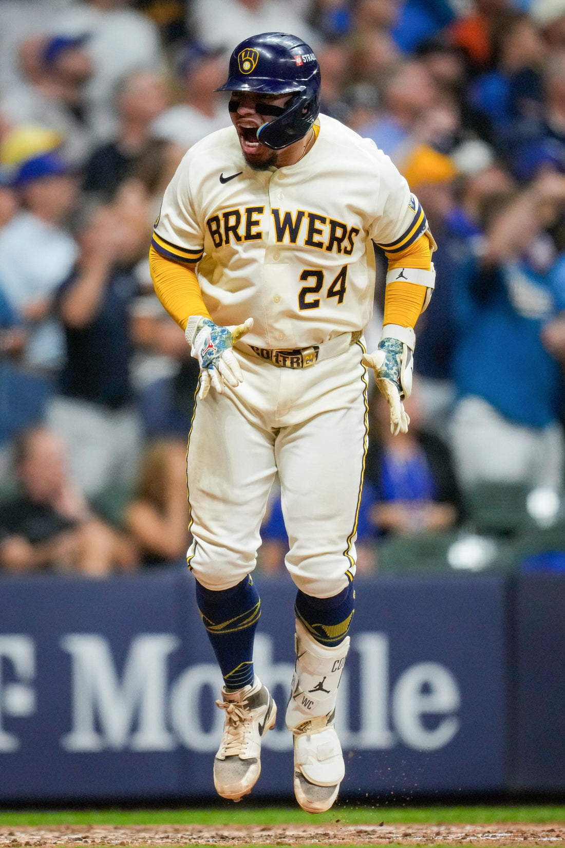 William Contreras celebrates a go-ahead RBI hit for Milwaukee against Los Angeles in Game 2 of the 2026 NLCS