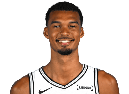 Victor Wembanyama wearing his current San Antonio Spurs white jersey