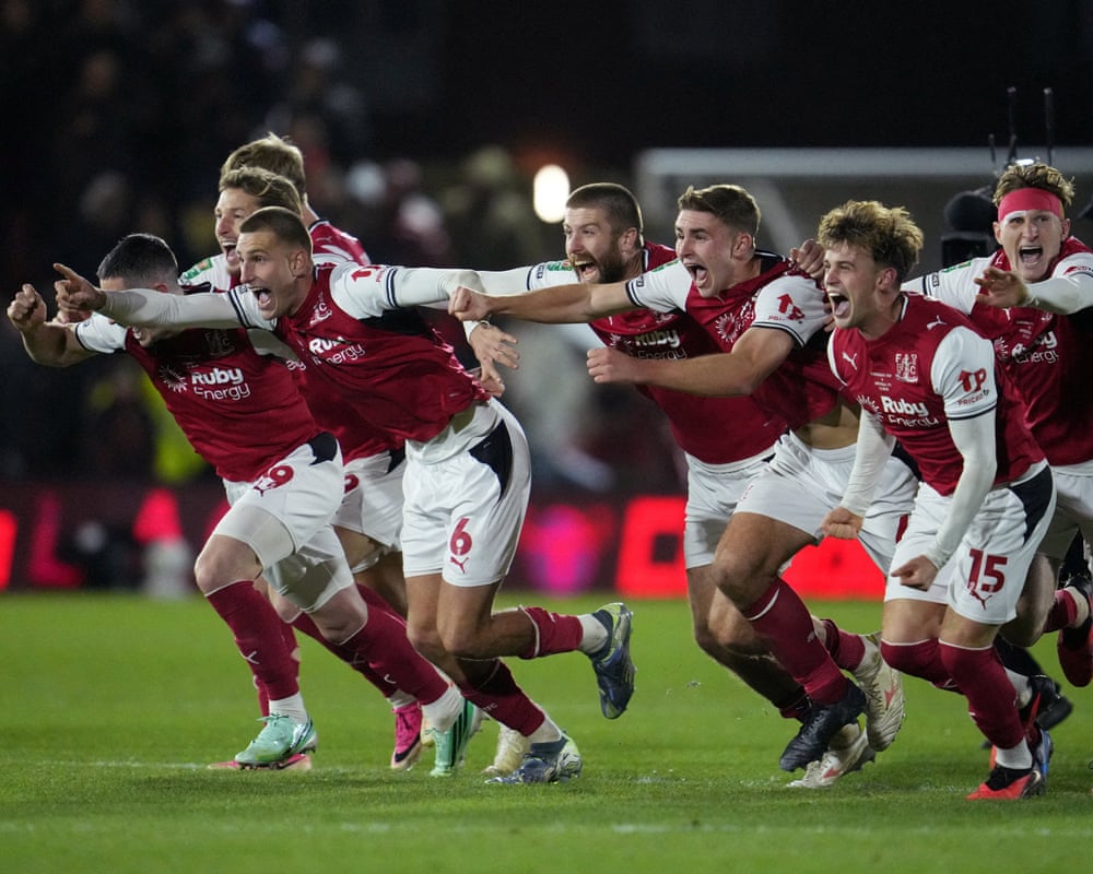Fleetwood Town players celebrate knocking Arsenal out of the 2026 Carabao Cup