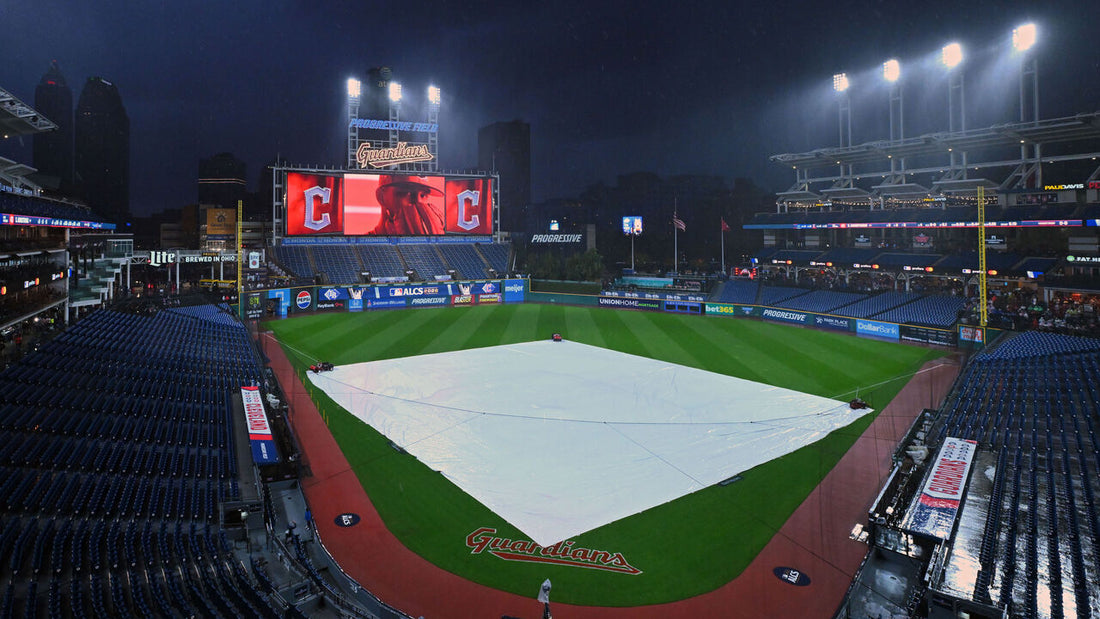 Tarp covering Progressive Field before postponed Guardians–Rays ALCS Game 4 on October 16, 2026