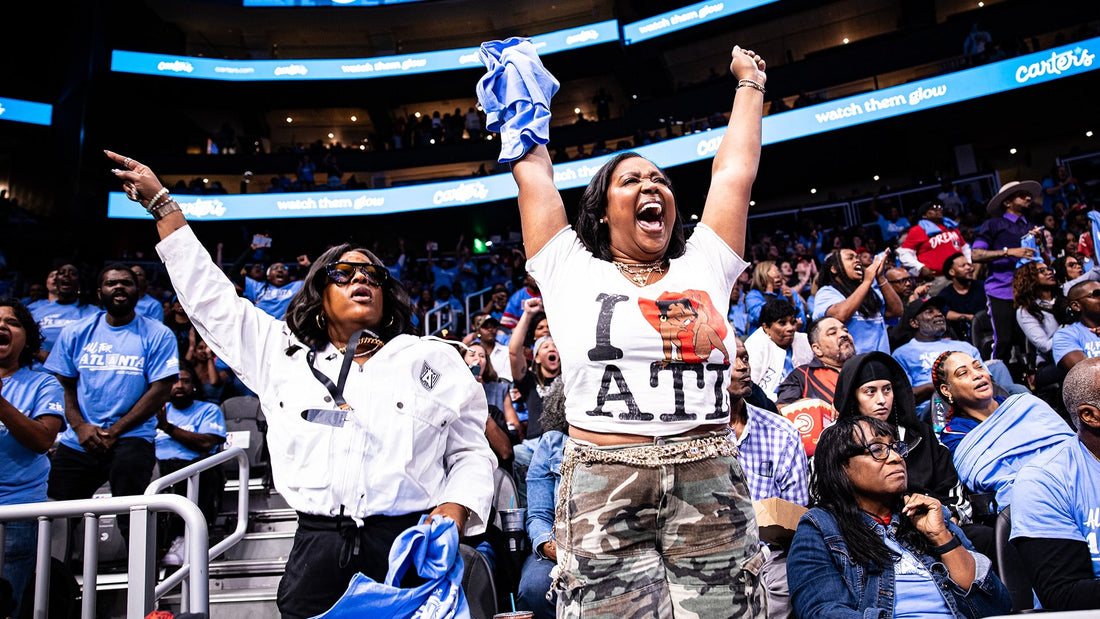 Atlanta Dream fans celebrate during the 2026 WNBA playoffs at State Farm Arena