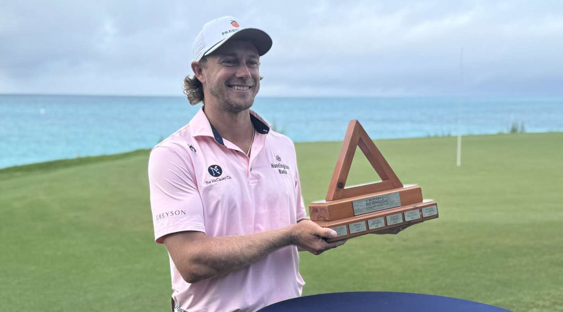 Austin Smotherman holds the 2026 Butterfield Bermuda Championship trophy after winning a Monday playoff