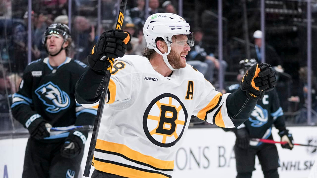 David Pastrnak in Boston Bruins hockey uniform during an NHL game