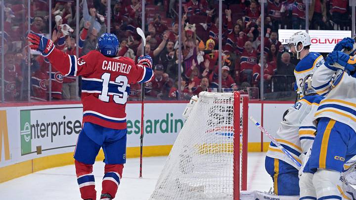 Cole Caufield celebrating in a red Montreal Canadiens jersey during the 2026 season