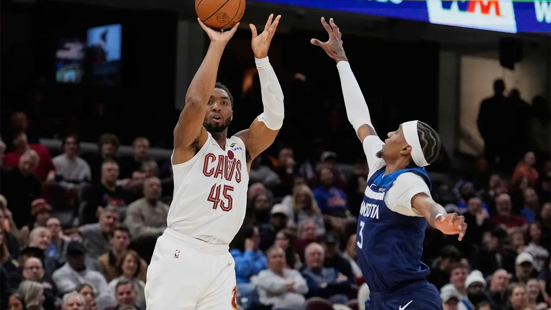 Donovan Mitchell shoots against the Timberwolves in an archival January 2026 matchup