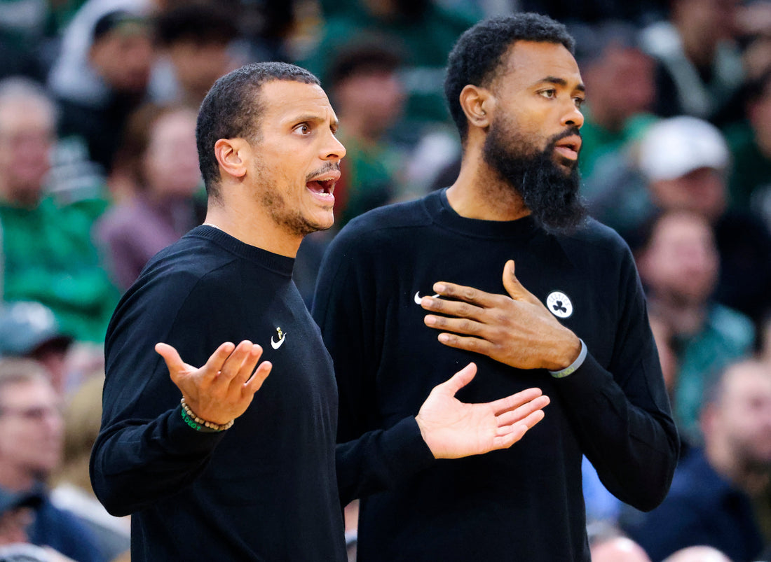 Joe Mazzulla and Tony Dobbins on the Boston Celtics sideline in November 2025