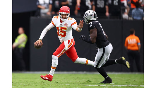 Patrick Mahomes directing the Kansas City Chiefs during an October 2026 game