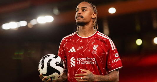 Bradley Barcola wearing Liverpool's 2026-27 red shirt