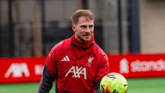 Alexis Mac Allister in Liverpool's red training top at the AXA Training Centre in February 2026