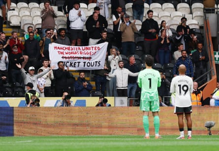 Manchester United supporters protesting club ownership outside Old Trafford