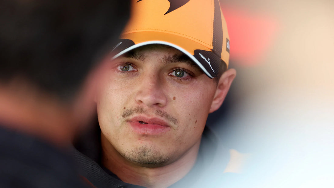 Lando Norris in McLaren team clothing speaking to reporters at the 2026 United States Grand Prix in Austin
