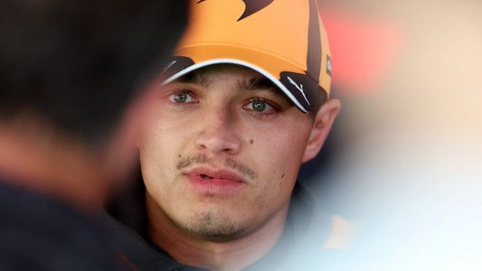 Lando Norris in McLaren team clothing speaking to reporters at the 2026 United States Grand Prix in Austin