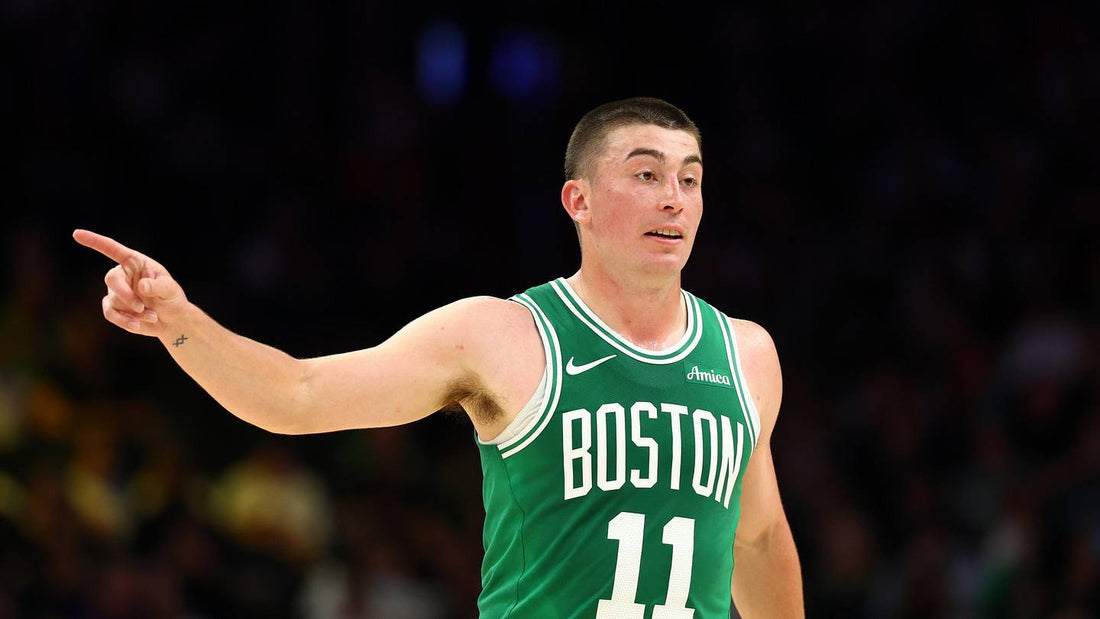 Payton Pritchard wearing a green Boston Celtics number 11 jersey during a 2026 NBA game