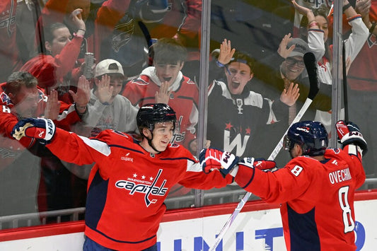 Ryan Leonard celebrates with Alex Ovechkin for the Washington Capitals