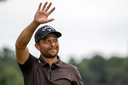 Xander Schauffele greets fans as he returns to defend his Baycurrent Classic title in Japan