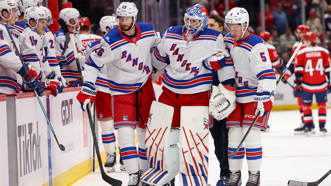 Rangers goaltender Igor Shesterkin helped off the ice in Washington on October 9, 2026