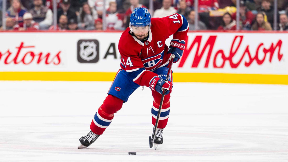 Nick Suzuki skates in Montreal Canadiens colors during the 2026 NHL season