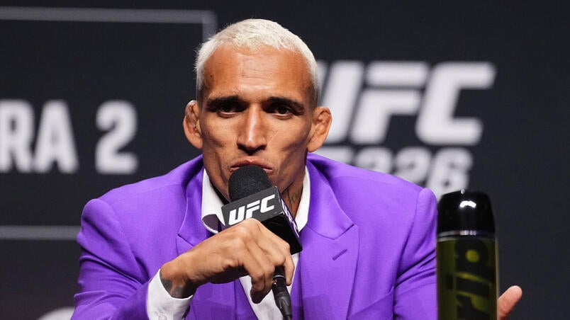 Charles Oliveira speaking at a UFC press conference in March 2026