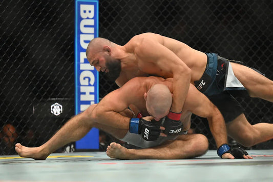 Khamzat Chimaev grapples Sean Strickland during their May 2026 UFC 328 middleweight title fight