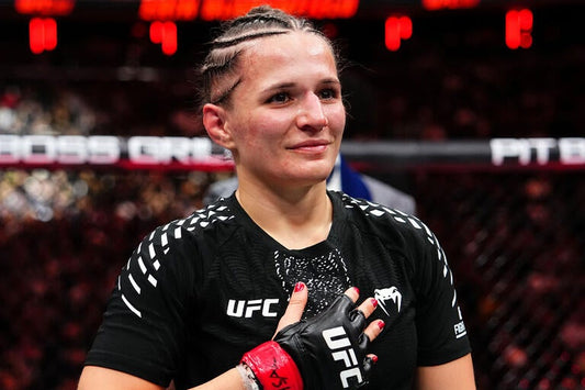 Erin Blanchfield in black UFC fight kit inside the Octagon