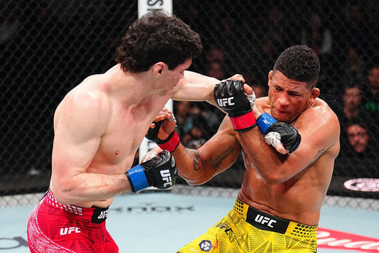 Mike Malott lands a punch against Gilbert Burns at UFC Winnipeg in April 2026