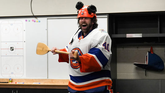 Semyon Varlamov celebrating in New York Islanders jersey after his first NHL win in 712 days