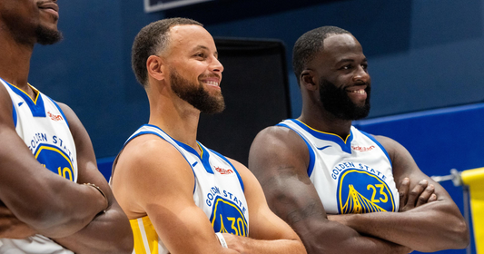 Stephen Curry and Draymond Green in Golden State Warriors uniforms
