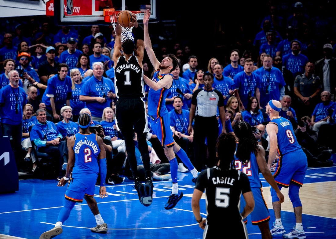 Victor Wembanyama in a Spurs uniform challenging Oklahoma City during the 2026 playoffs