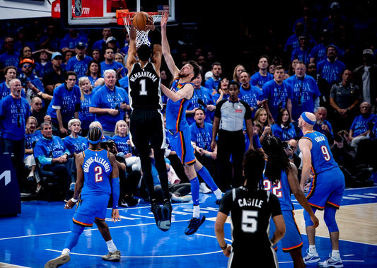 Victor Wembanyama in a Spurs uniform challenging Oklahoma City during the 2026 playoffs