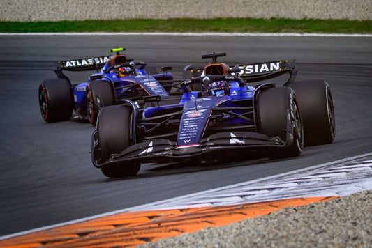 Carlos Sainz and Alex Albon driving the Williams FW48