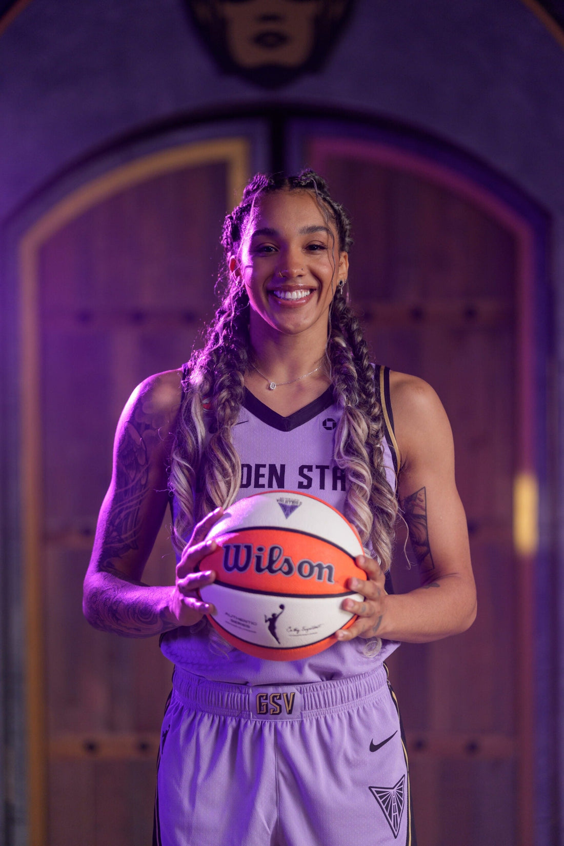 Gabby Williams in the Golden State Valkyries' 2026 lavender uniform, official media-day portrait