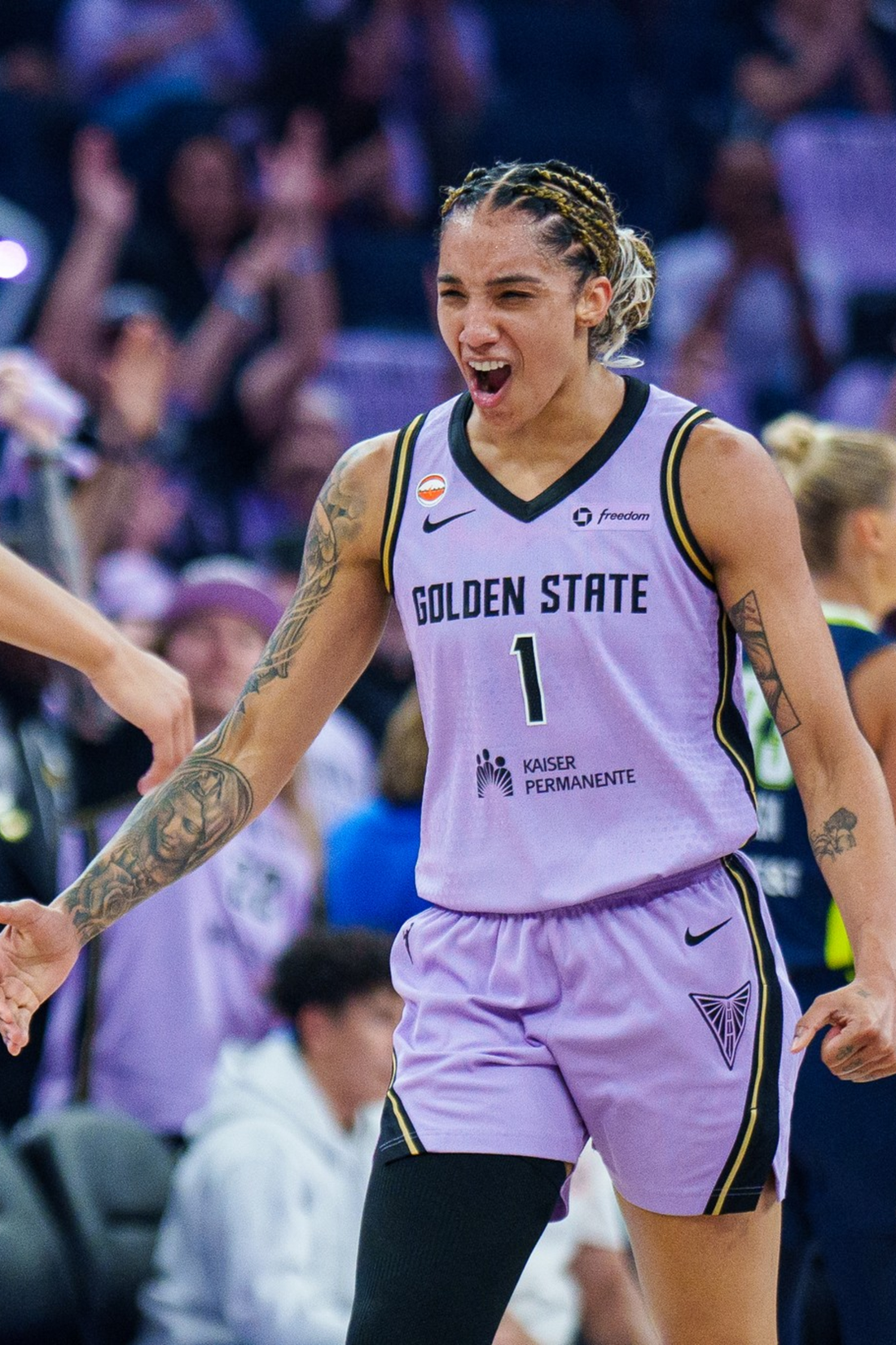 Gabby Williams and Veronica Burton celebrate during the Golden State Valkyries' 2026 playoff run