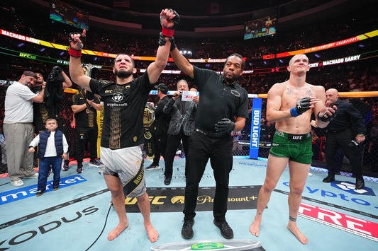 Ian Machado Garry and Islam Makhachev after their UFC 330 welterweight title fight