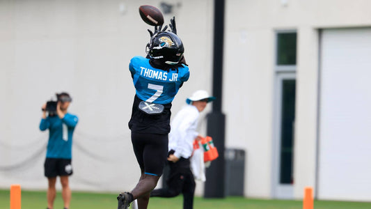 Brian Thomas Jr. catches a football at Jacksonville Jaguars training camp in 2026