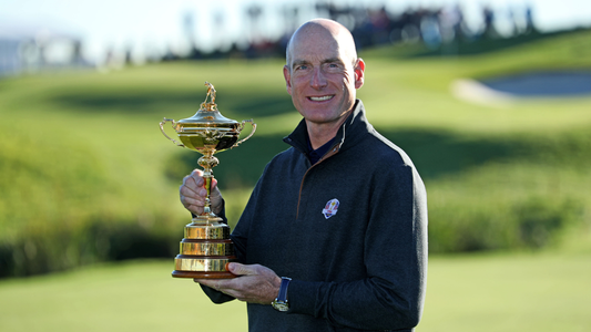Jim Furyk holding the Ryder Cup trophy