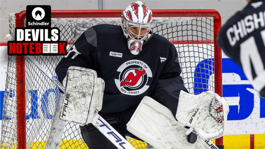 Connor Hellebuyck practicing in New Jersey Devils gear in October 2026