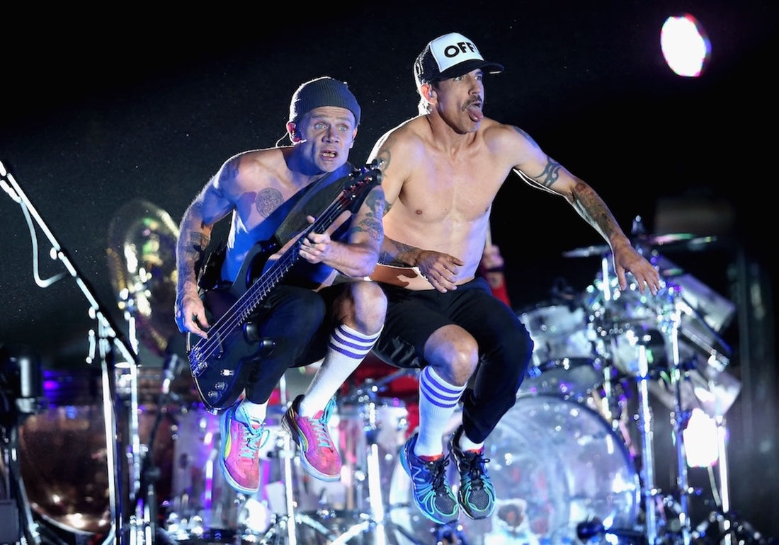 Red Hot Chili Peppers performing with high-energy movement, ideal for a fast running playlist
